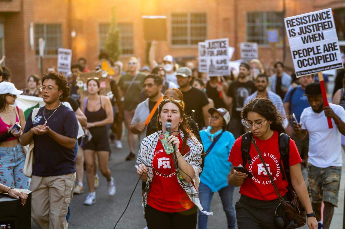 Demonstrators march in downtown Durham following a rally organized by the Party for Socialism and Liberation at CCB Plaza on Wednesday, July 23, 2025, demanding that ICE officers stay out of the city. An organizer with Siembra NC said federal Immigration and Customs Enforcement officers were at the Durham County Courthouse to detain a man scheduled to appear in court that day. The unidentified man did not show up.