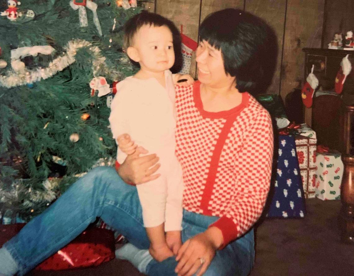 Bobby Whitt is shown here with his mother Myoung Hwa Cho celebrating Christmas in 1989. Their family in Ohio learned last week that Bobby’s father killed his wife and son in 1998, leaving their unidentified bodies, respectively, in North Carolina and South Carolina.