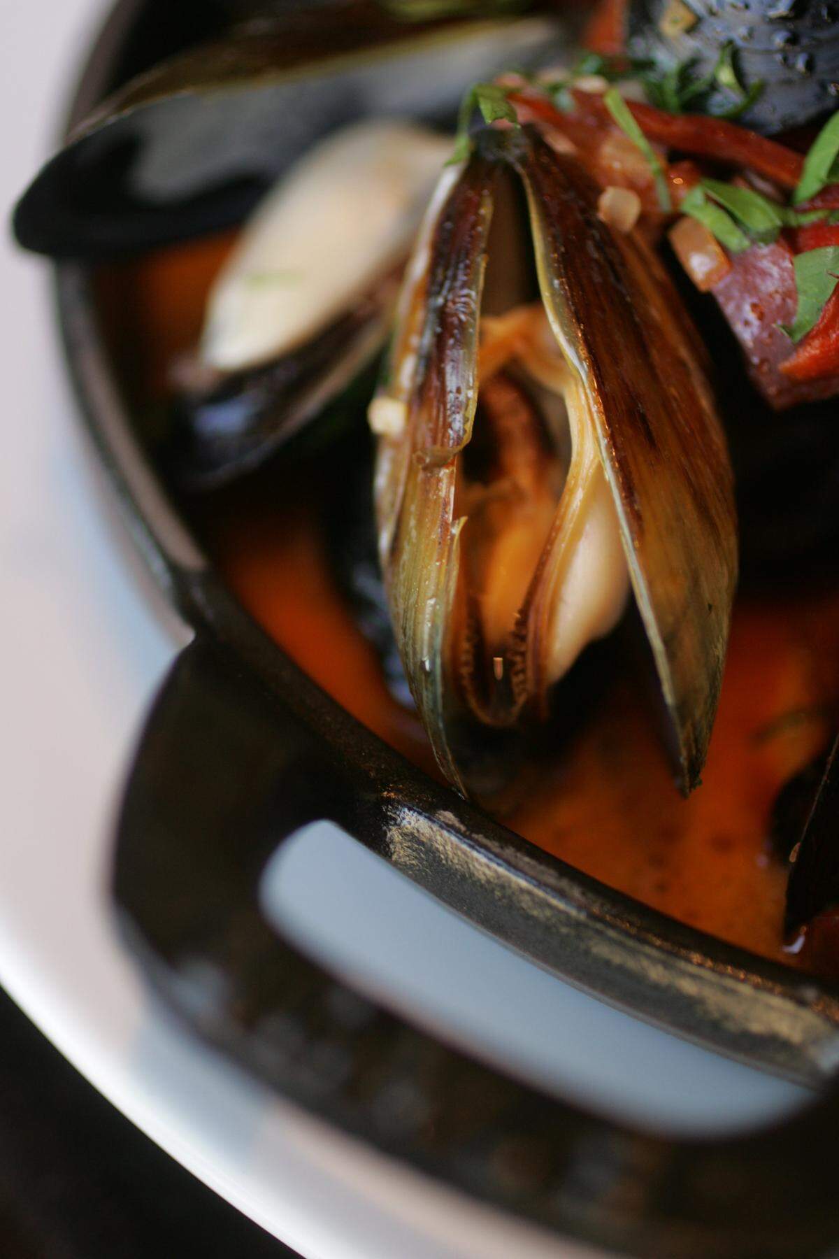 The Moules Frites are made up of chorizo and roasted red pepper at Coquette Brasserie in Raleigh.