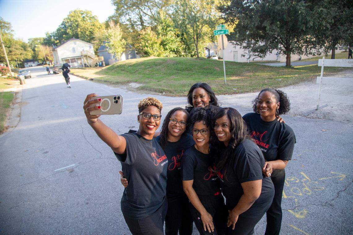 WakeMed doctors, collectively known as the Sister Circle, take a selfie while filming a WakeMed commercial recently. The group helped bring COVID-19 vaccines to Black and brown residents of Southeast Raleigh. They are (front): Rasheeda Monroe, Michele Benoit-Wilson, Jacqueline Hicks and Netasha McLawhorn; (back): Nerissa Price and Tiffany Lowe-Payne.