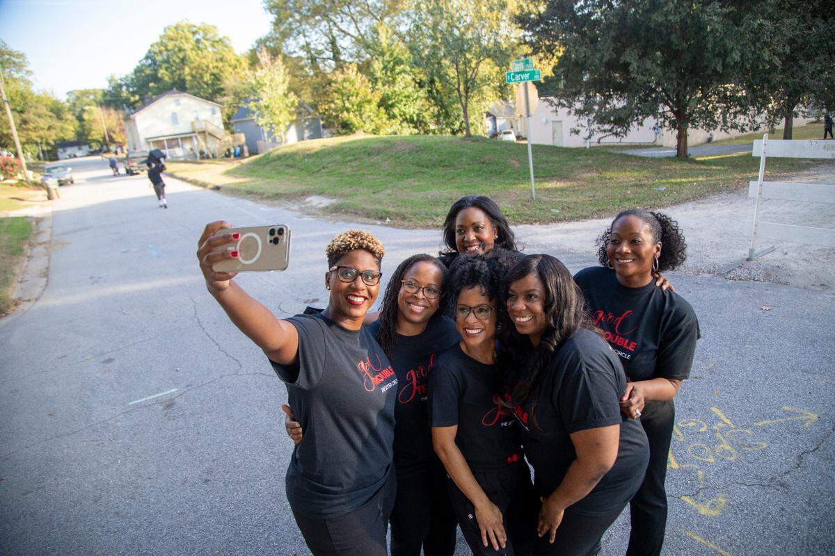 WakeMed doctors, collectively known as the Sister Circle, take a selfie while filming a WakeMed commercial recently. The group helped bring COVID-19 vaccines to Black and brown residents of Southeast Raleigh. They are (front): Rasheeda Monroe, Michele Benoit-Wilson, Jacqueline Hicks and Netasha McLawhorn; (back): Nerissa Price and Tiffany Lowe-Payne.