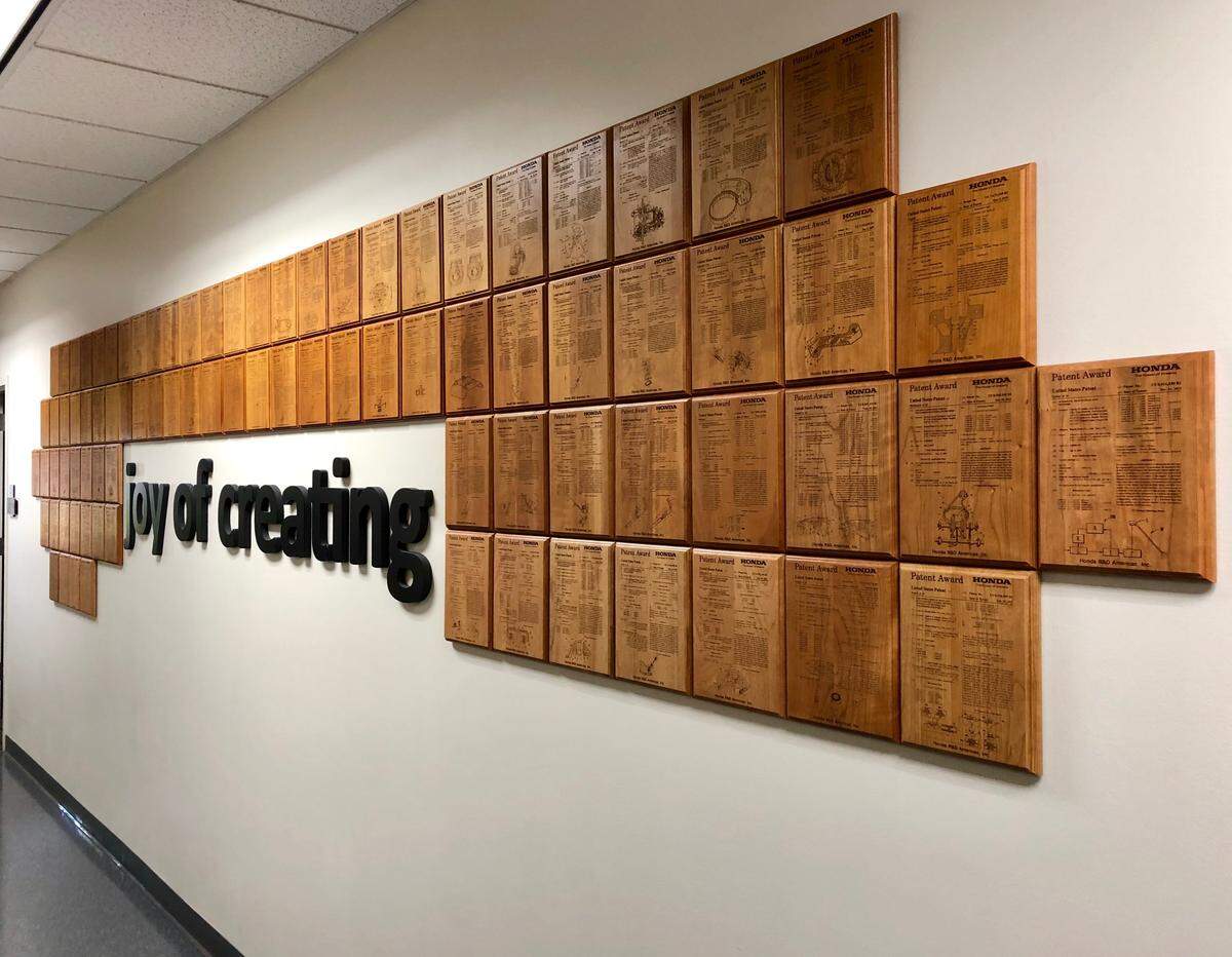 A wall of patents awarded to members of the Honda Power Equipment research and development team in Swepsonville, N.C.