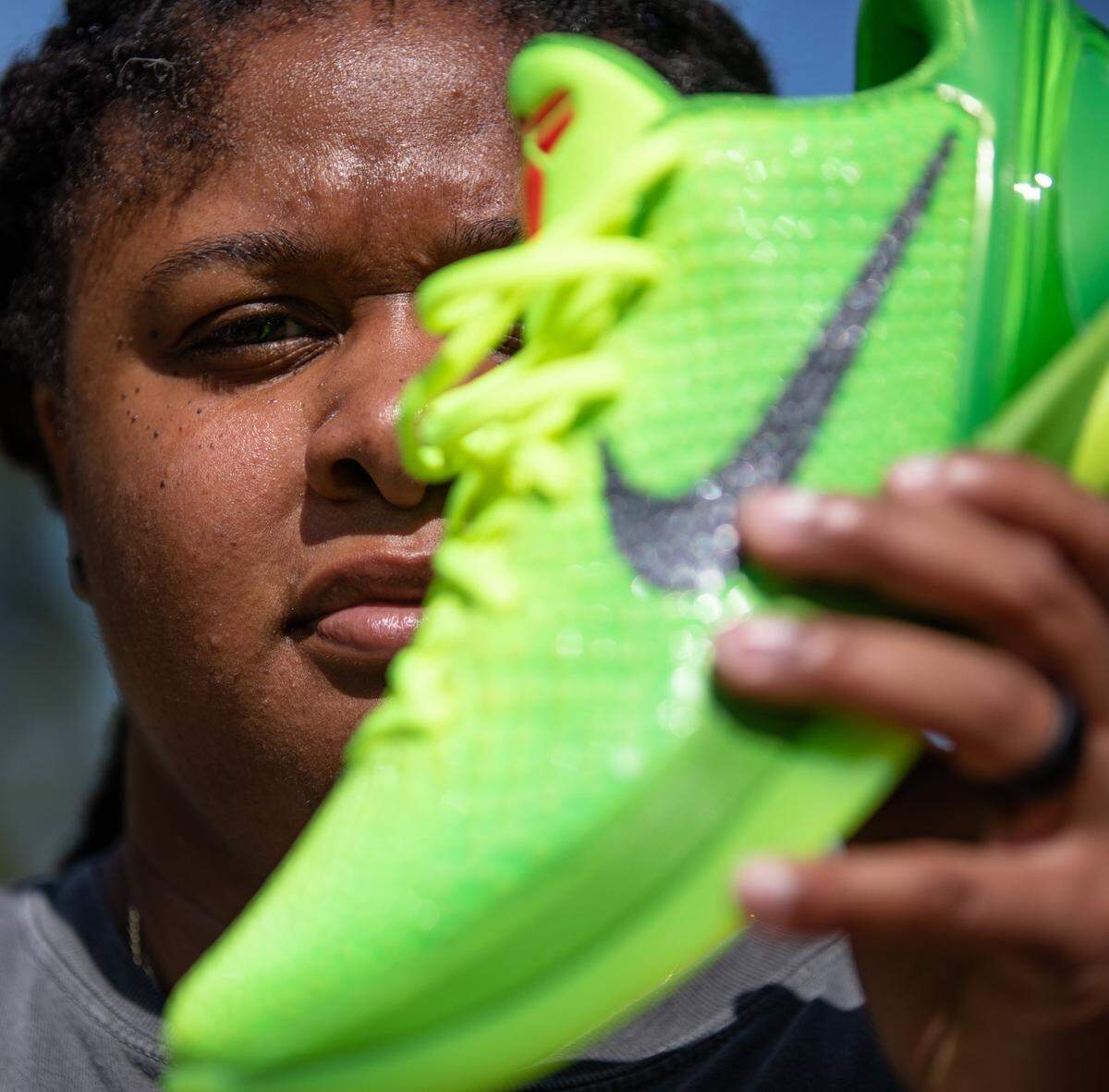 Kala Nwachukwu poses for a portrait at Durham Central Park in Durham, N.C. on Monday, June 12, 2023. Nwachukwu has over 150 pairs of sneakers in her closet, a passion which in 2014 led her to start The Kickback Sneaker Expo. The biannual event, which will take place at the Raleigh Convention Center this weekend, drew 4,000 attendees last year.