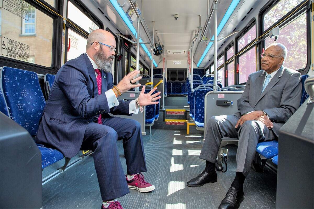 Former Chapel Hill Mayor Howard Lee takes a bus ride with Chapel Hill Transit Director Brian Litchfield in 2019, roughly 45 years after Lee led the creation of the bus system serving Chapel Hill, Carrboro and UNC.