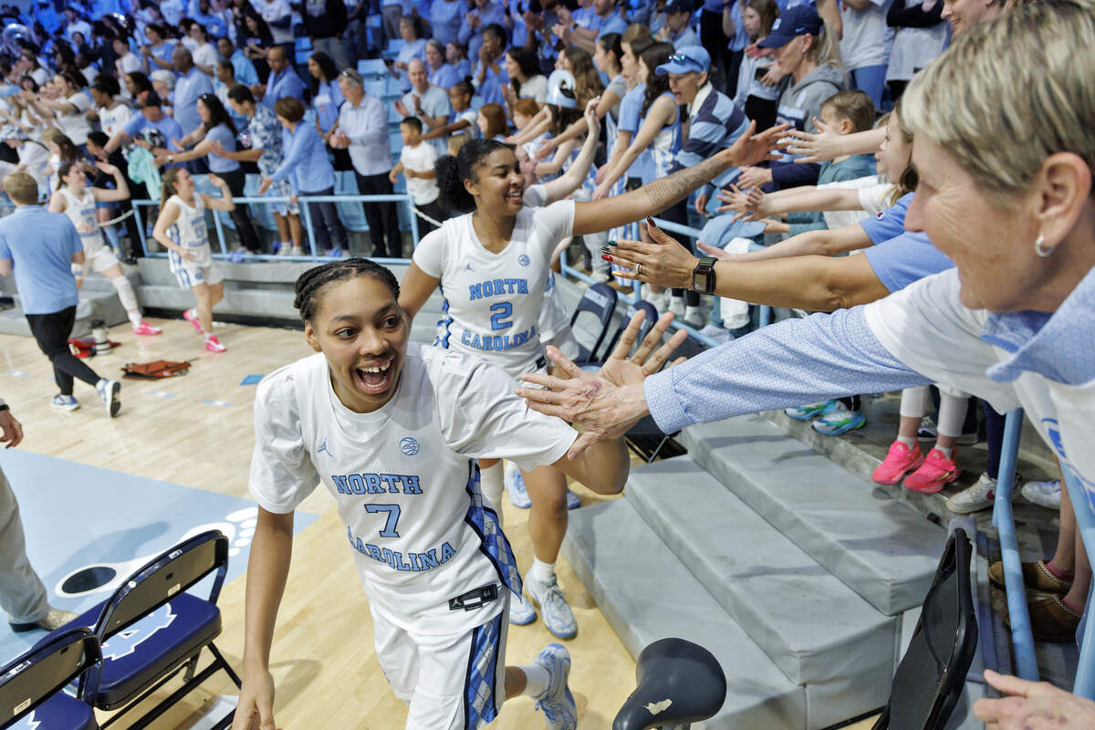 North Carolina’s Nyla Brooks high-fives fans following the Tar Heels’ 74-69 win over Duke on Sunday, March 1, 2026, at Carmichael Arena in Chapel Hill, N.C. 