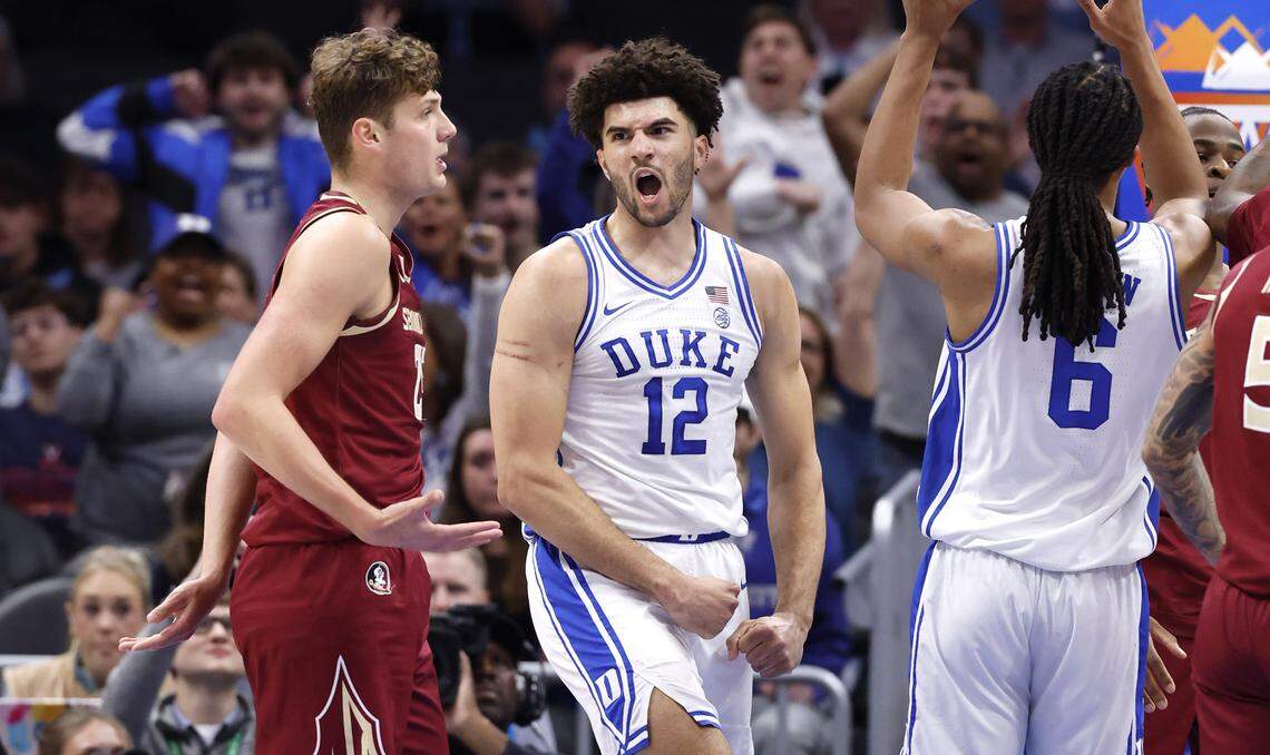 Duke’s Cameron Boozer (12) celebrates after making the basket while being fouled in the first half of Duke’s game against Florida State in the quarterfinals of the 2026 ACC Men’s Basketball Tournament at the Spectrum Center in Charlotte, N.C., Thursday, March 12, 2026.