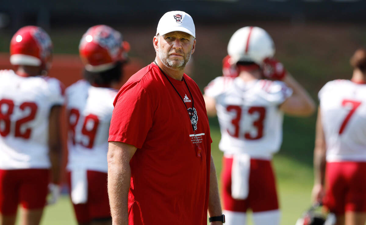 N.C. State head coach Dave Doeren watches during the Wolfpack’s first practice of fall camp in Raleigh, N.C., Wednesday, August 3, 2022.
