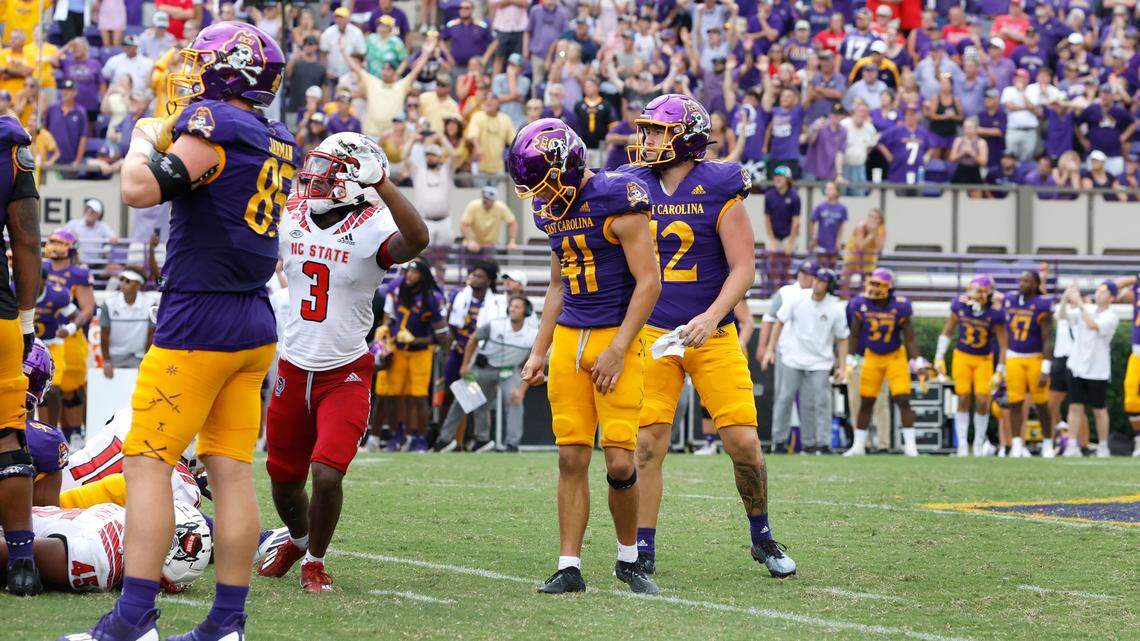 East Carolina’s Owen Daffer (41) reacts after missing a potential game-winning field goal with five seconds left in the game during N.C. State’s 21-20 victory over ECU at Dowdy-Ficklen Stadium in Greenville, N.C., Saturday, Sept. 3, 2022. N.C. State’s Aydan White (3) is to the left.