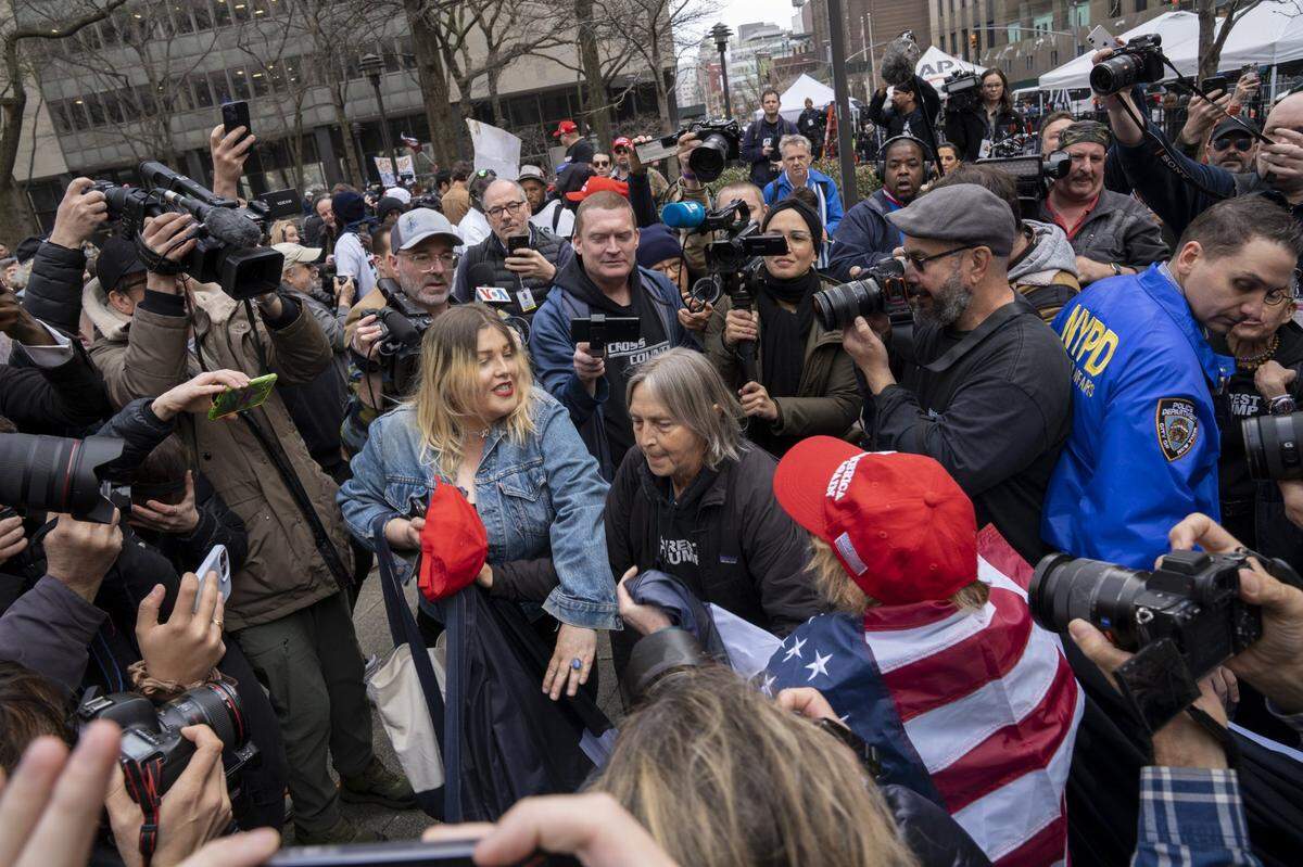 Protesters clash outside the Manhattan Criminal Courthouse in New York City on Tuesday, April 4, 2023.