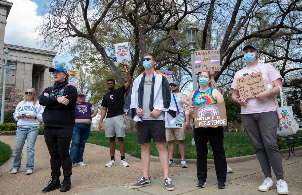 Protesters advocate for trans visibility and resistance outside the Capitol in Raleigh on Sunday, March 30, 2025.