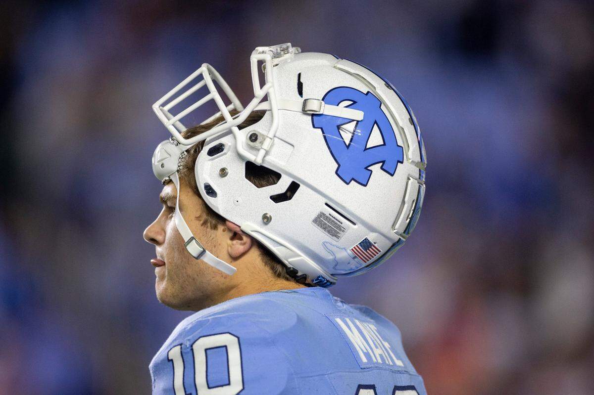 North Carolina quarterback Drake Maye (10) watches Virginia run out the clock after the Tar Heels turned the ball over to Virginia on fourth down late in the fourth quarter on Saturday, October 21, 2023 at Kenan Stadium in Chapel Hill, N.C.