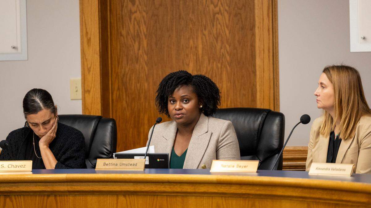 Durham Public Schools Board of Education Board Chair Bettina Umstead, center, announces the resignation of Superintendent Pascal Mubenga during a school board meeting Thursday, Feb. 7, 2023 in Durham. Mubenga resigned less than one month after accounting errors and withdrawn raises threw the district into chaos.
