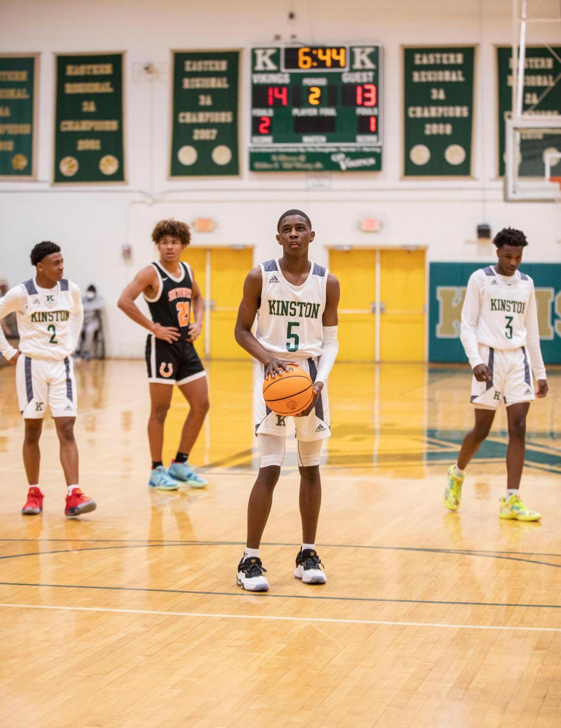 Kinston Vikings varsity basketball player Jyrah Canady (5) prepares to shoot a free throw during a home game against the Southwest Onslow Stallions in Kinston, N.C. on Friday, Jan. 28, 2022.