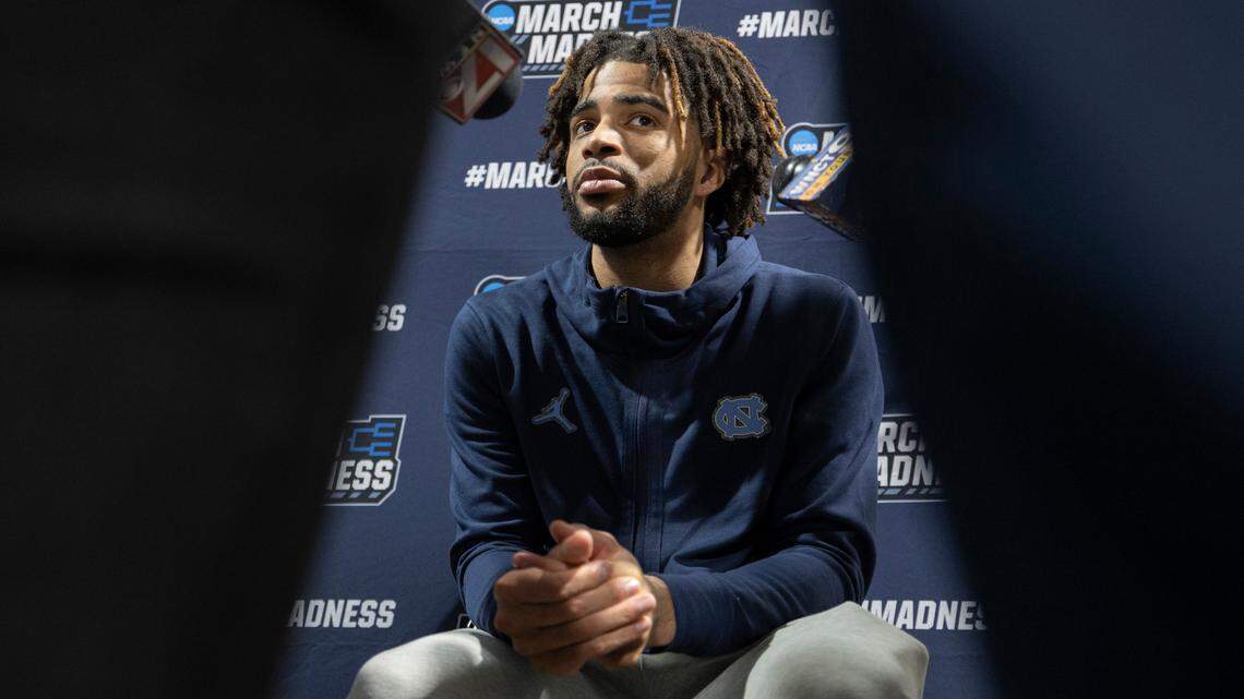 North Carolina’s R.J. Davis (4) is surround by reporters as he takes questions during the Tar Heels’ media availability on Friday, March 22, 2024 at Spectrum Center in Charlotte, N.C.
