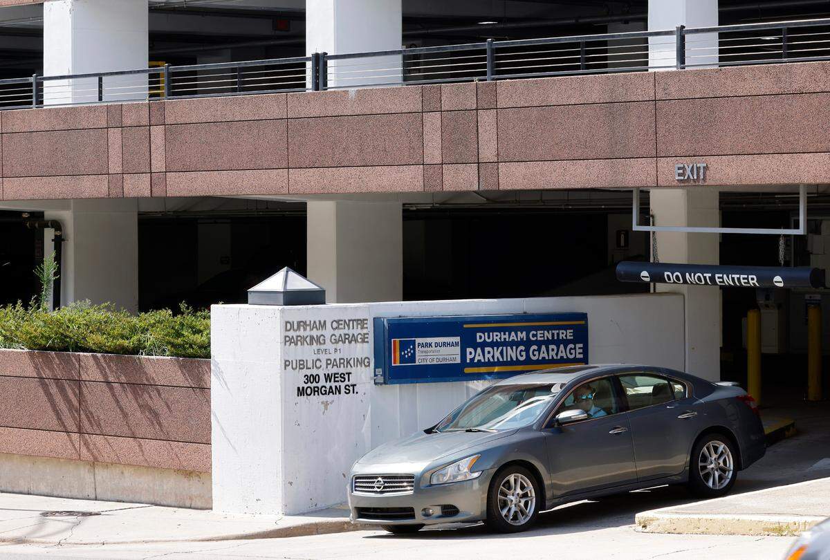 A vehicle exits the Durham Centre Parking Garage on the afternoon of Tuesday, August 2, 2022, in Durham, N.C.