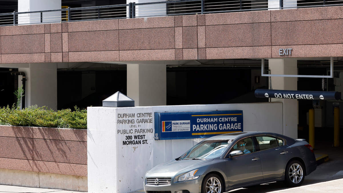 A vehicle exits the Durham Centre Parking Garage on the afternoon of Tuesday, August 2, 2022, in Durham, N.C.