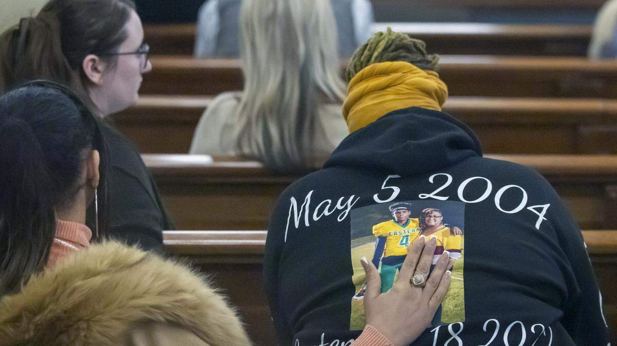Devin Clark’s mother Tiffany Concepcion, center, is consoled by friends as she listens to the verdict in Issiah Ross’ trial in Orange County Superior Court on Thursday, January 29, 2026 in Hillsborough, N.C. Ross was found guilty of second degree murder in the death of   Devin Clark in Efland in 2022. 