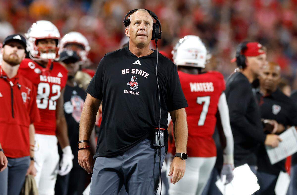 N.C. State head coach Dave Doeren looks up at the scoreboard during the first half of N.C. State’s game against Tennessee in the Duke’s Mayo Classic at Bank of America Stadium in Charlotte, N.C., Saturday, Sept. 7, 2024.