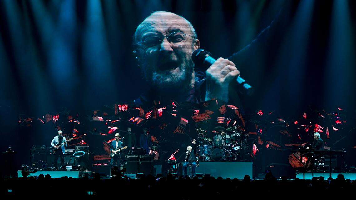 Singer Phil Collins leads Genesis as they play in their “The Last Domino?” tour at the United Center on Monday, Nov. 15, 2021, in Chicago.