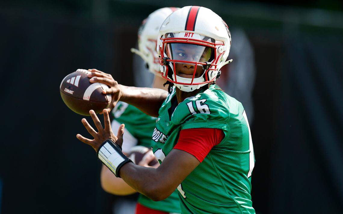 N.C. State quarterback CJ Bailey (16) prepares to throw during the Wolfpack’s first practice in Raleigh, N.C., Wednesday, July 31, 2024.