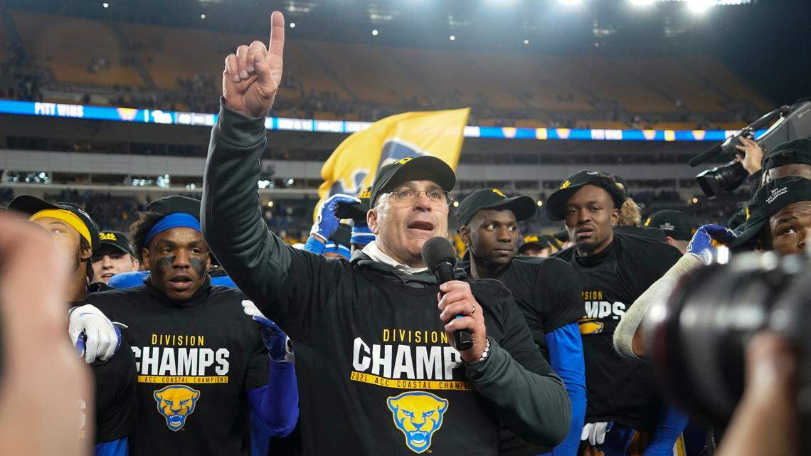 Pittsburgh head coach Pat Narduzzi addresses the crowd with the team behind him after defeating Virginia to clench the ACC Coastal division championship in 2021.