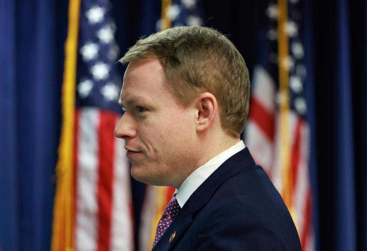 N.C. Speaker of the House Destin Hall speaks with a reporter following a press conference about the budget bill at the Legislative Building on Tuesday, May 20, 2025, in Raleigh, N.C.