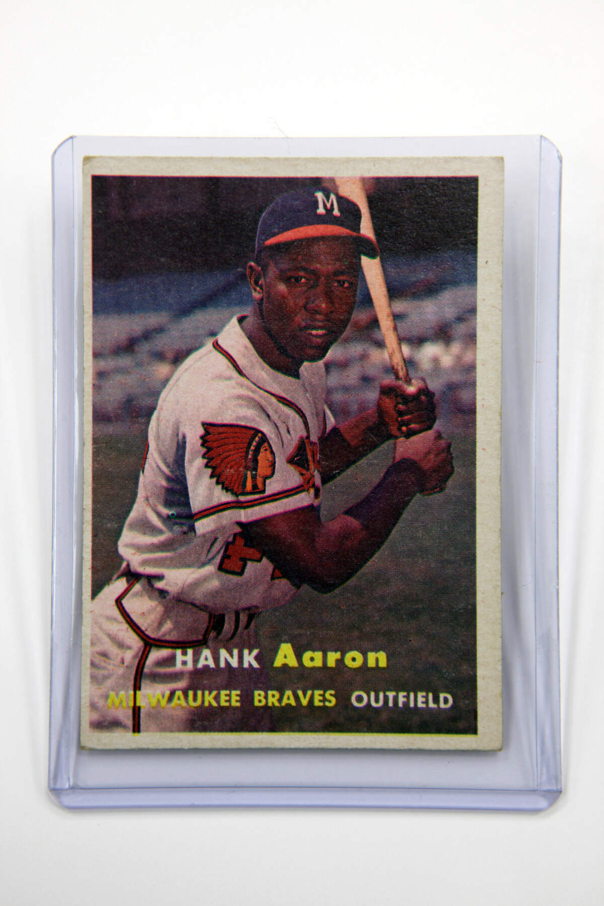 A Topps baseball card depicting Hank Aaron is displayed for a photograph in New York on Feb. 11, 2010.