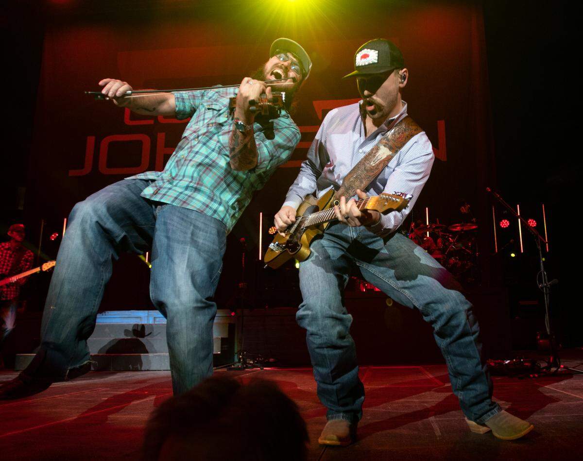 Cody Johnson’s band members jam at Raleigh, N.C.’s PNC Arena, Saturday night, Jan. 28, 2023.