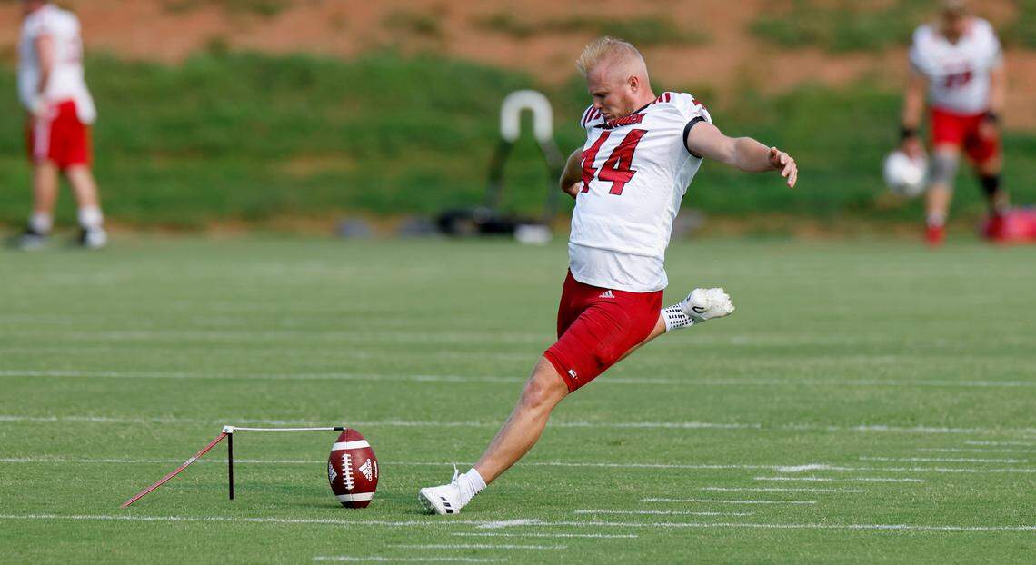 N.C. State’s Brayden Narveson (44) practices his kick before the Wolfpack’s first fall practice in Raleigh, N.C., Wednesday, August 2, 2023.