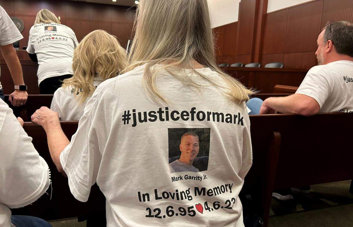 Mark Garrity’s family and supporters wore T-shirts in a Wake County courtroom in 2024 before a local shopkeeper was convicted of secondary manslaughter for fatally stabbing Garrity.