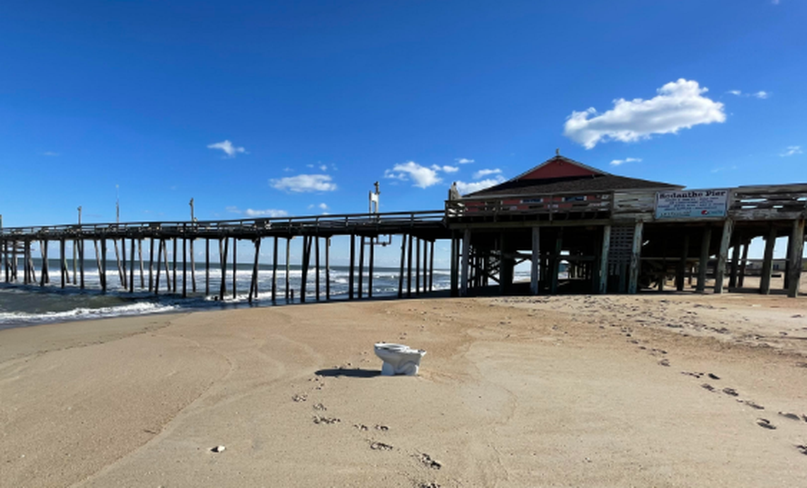 A toilet appeared on the beach after the house in Rodanthe collapsed Monday, March 13, locals say.