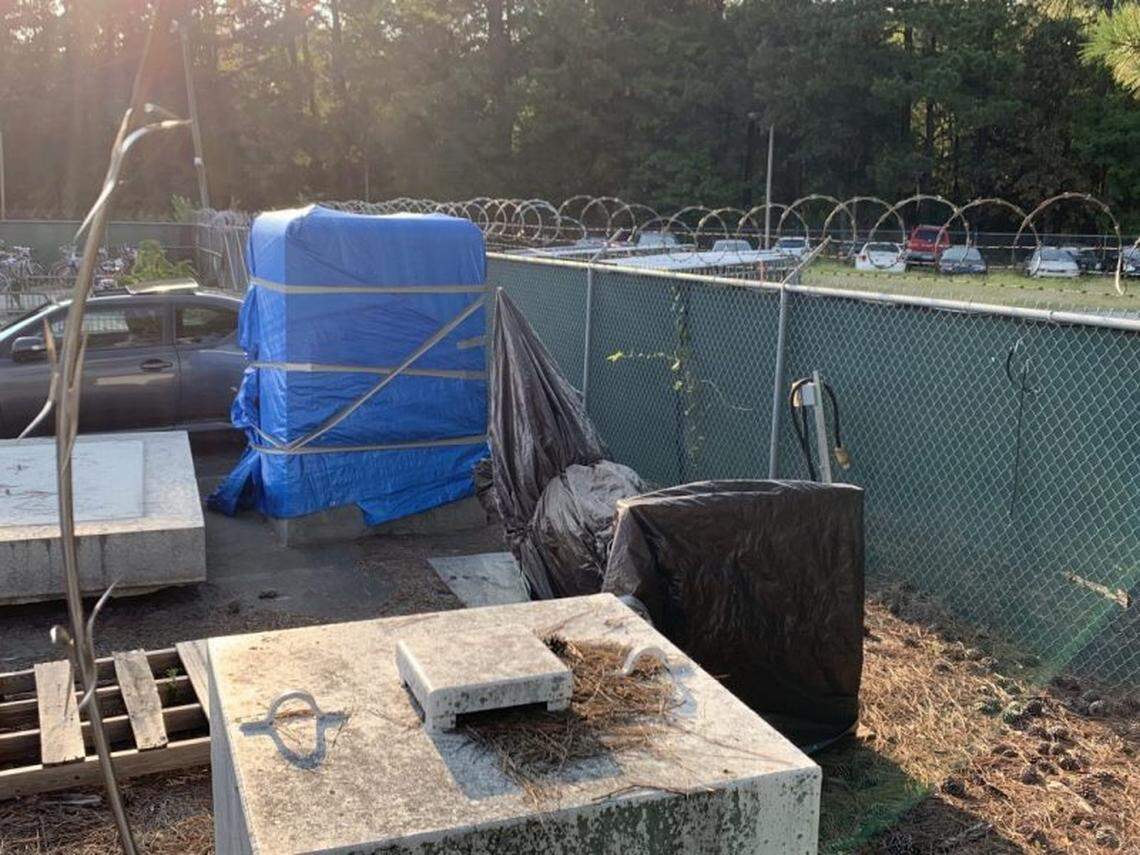 A student reporter for Carolina Connection found objects that appear to be pieces of the Silent Sam Confederate monument concealed under tarps at a UNC storage area in Chapel Hill.