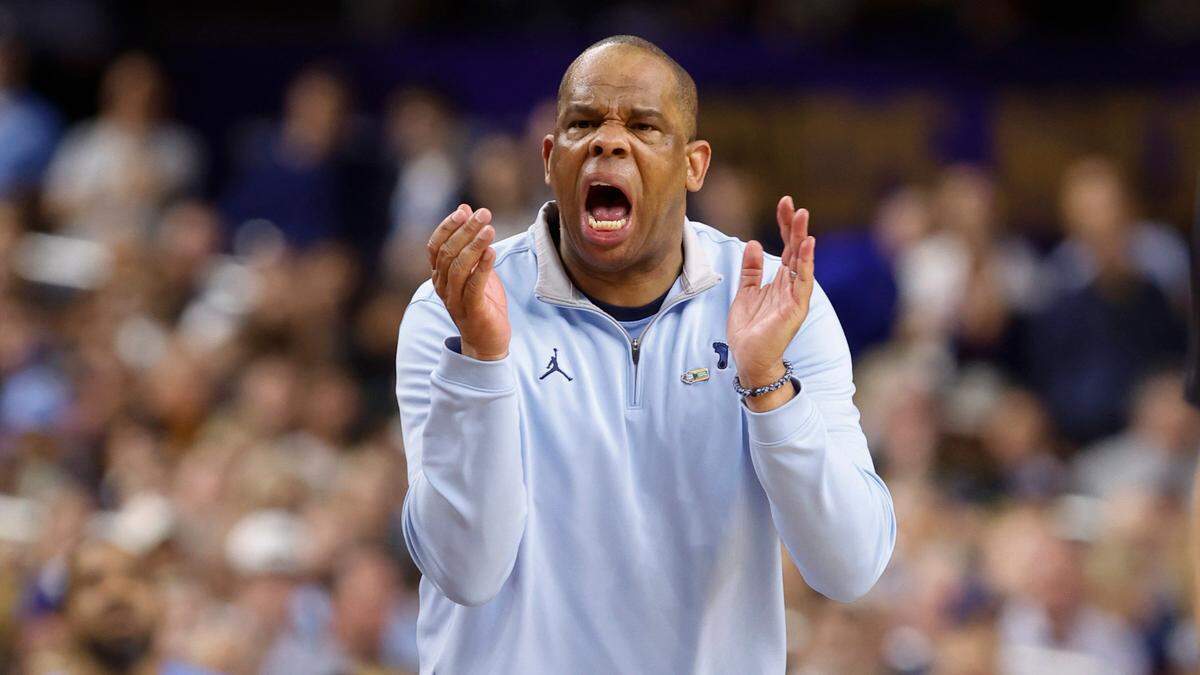 North Carolina head coach Hubert Davis encourages his team during the first half of Dukeís game against UNC in the Final Four at Caesars Superdome in New Orleans, La., Saturday, April 2, 2022.