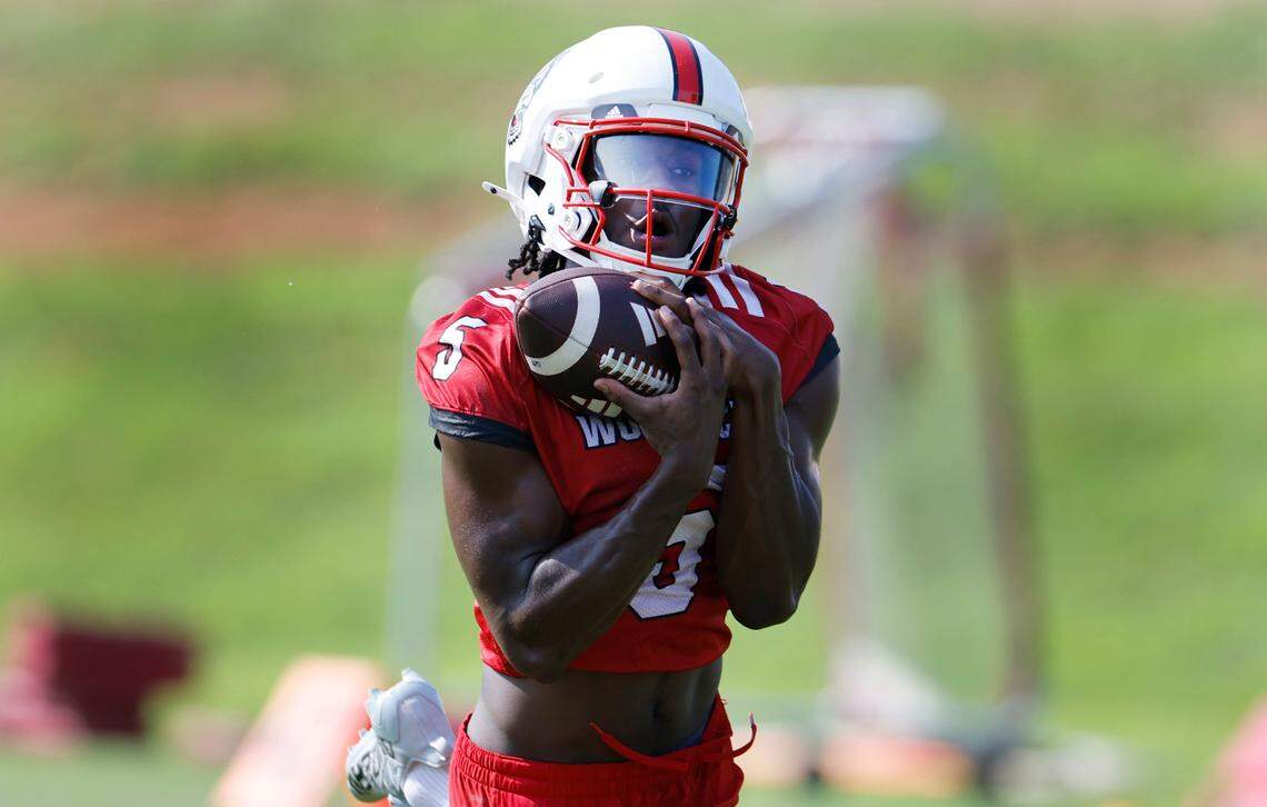 N.C. State wide receiver Noah Rogers (5) pulls in a pass during the Wolfpack’s first practice in Raleigh, N.C., Wednesday, July 31, 2024.