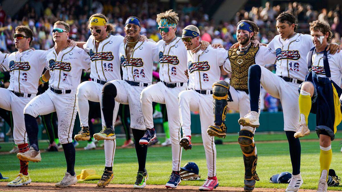 Savannah Bananas players line-up together Friday, June 30, 2023, during the Savannah Bananas World Tour at Victory Field in Indianapolis.