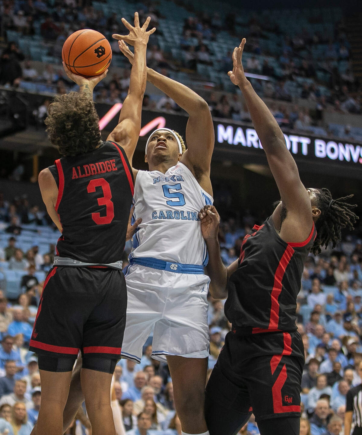 Gardner-Webb’s Quest Aldridge (3) defends North Carolina’s Armando Bacot (5) during the first half on Tuesday, November 15, 2022 at the Smith Center in Chapel Hill, N.C.
