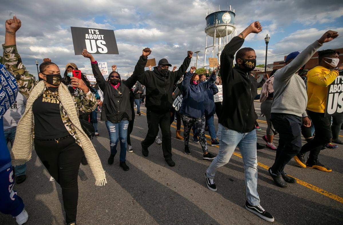 Demonstrators begin their march in downtown Elizabeth City, NC on US 17 on Thursday, April 22, 2021 in reaction to the death of Andrew Brown Jr., who was shot by a Pasquotank County Deputy Sheriff on Wednesday. The march drew nearly 300 participants and lasted about three hours.