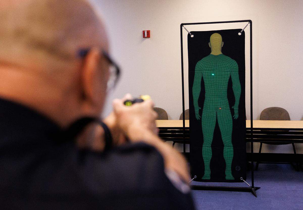 Pinehurst Police Deputy Chief Ken Hall demonstrates the use of a Taser 7 on Tuesday, Oct. 29, 2024, at the Pinehurst Police Department in Pinehurst, N.C.