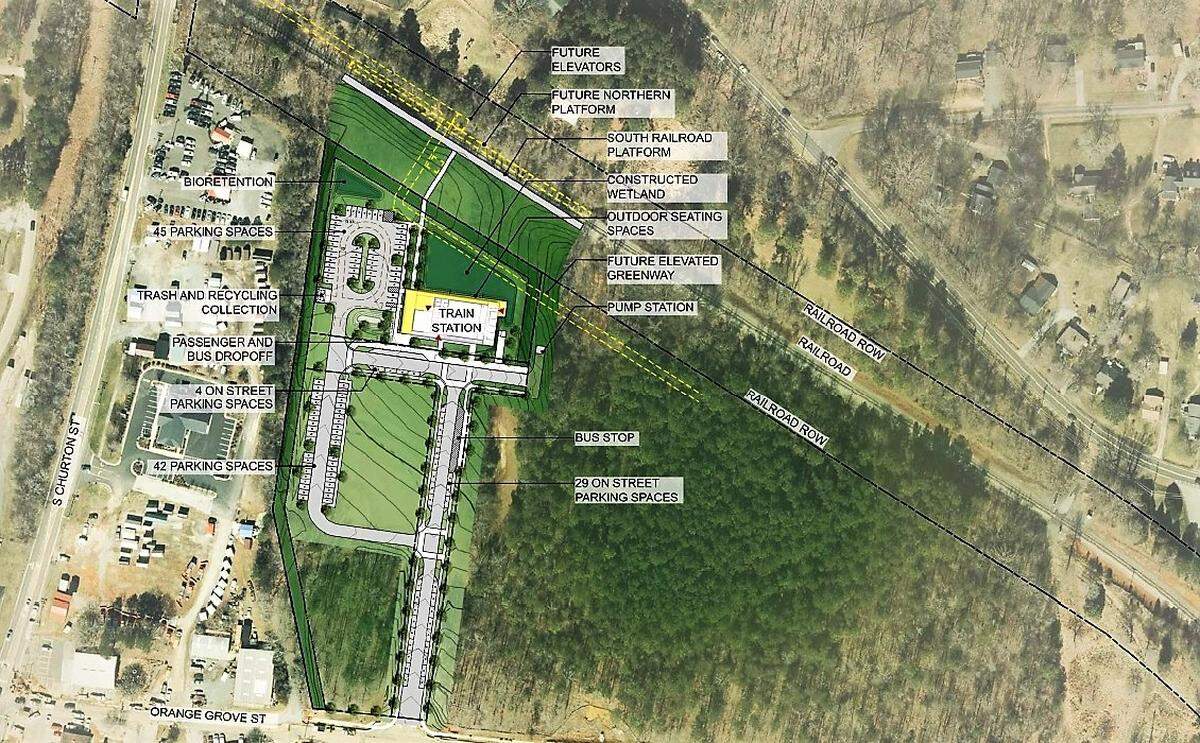 A proposed train station and civic building could occupy roughly six acres on the 20-acre site. Town officials could decide in the future how to best use the remaining land.