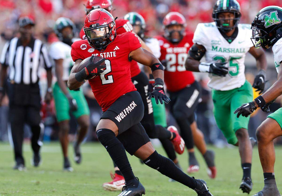N.C. State running back Michael Allen (2) beats the Marshall defense to score on a 37-yard touchdown run during the second half of N.C. State’s 48-41 victory over Marshall at Carter-Finley Stadium in Raleigh, N.C., Saturday, Oct. 7, 2023.