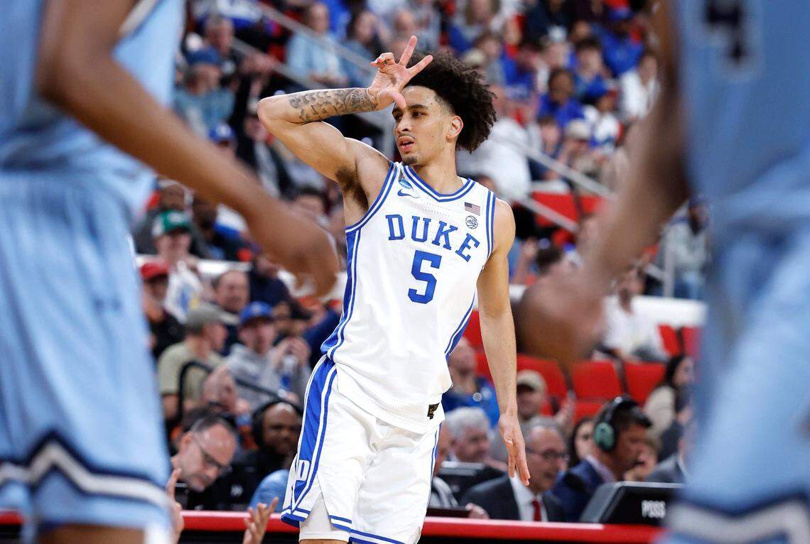 Duke’s Tyrese Proctor (5) celebrates making a three-pointer during the second half of Duke’s 93-49 victory over Mount St. Mary’s in the first round of the 2025 NCAA Men’s Basketball Tournament at the Lenovo Center in Raleigh, N.C., Friday, March 21, 2025.
