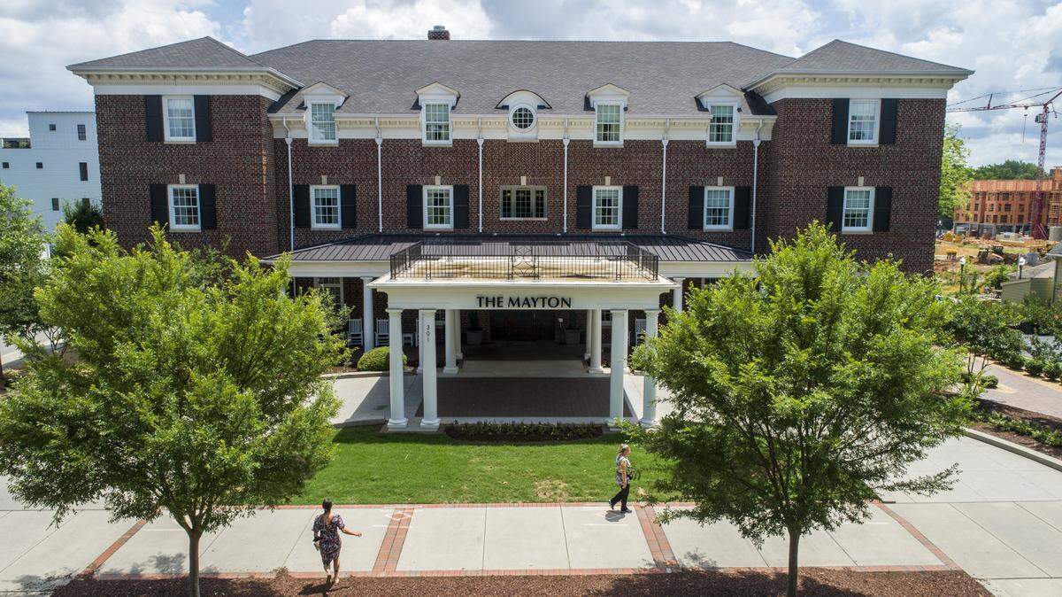 Hometown developers and partners Bill Zahn, George Jordan III and Jordan Gussenhoven bought The Mayton Inn in June 2020 after it went bankrupt. Hospitality firm Early Bird Night Owl operate the hotel and rebranded it as The Mayton.