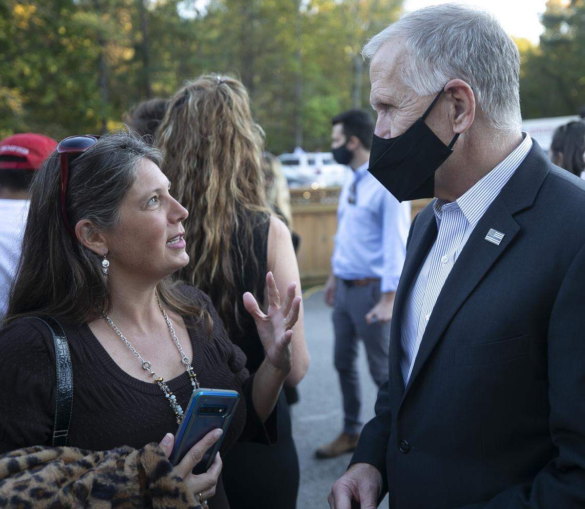 Michele Morrow talks with Sen.Thom Tillis during a campaign stop at the Angus Barn in Raleigh on Friday, October, 30, 2020.