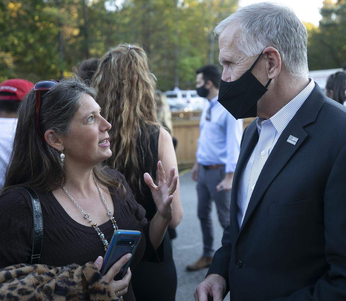 Michele Morrow talks with Sen. Thom Tillis during a campaign stop at the Angus Barn in Raleigh on Friday, October, 30, 2020.