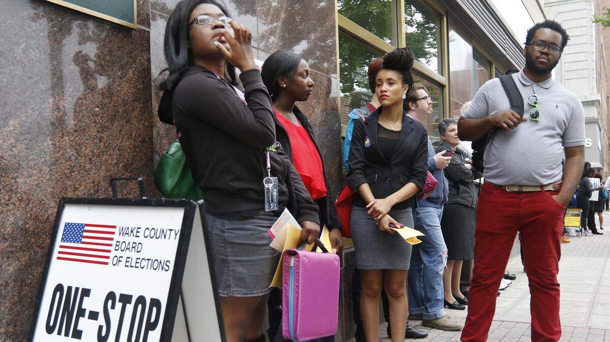 More than 100 Shaw University and St. Augustine’s University students marched to vote on Oct. 1, 2014.