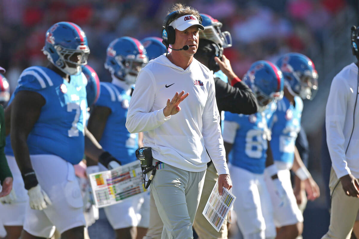 Ole Miss coach Lane Kiffin looks on during a time out during Saturday’s second quarter against the LSU Tigers at Vaught-Hemingway Stadium in Oxford, Miss.