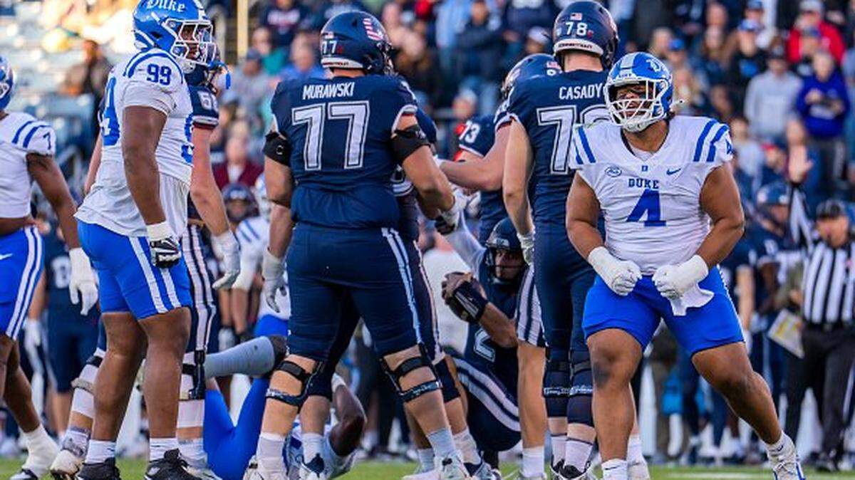 EAST HARTFORD, CONNECTICUT - NOVEMBER 08: Josiah Green #4 of the Duke Blue Devils reacts after a sack against Joe Fagnano #2 of the Connecticut Huskies during the first half of an NCAA football game at Rentschler Field on November 08, 2025 in East Hartford, Connecticut. (Photo by Joe Buglewicz/Getty Images)