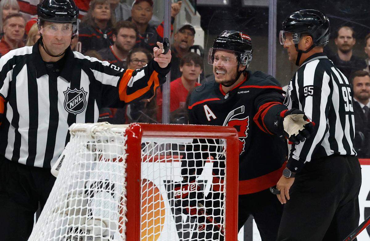 Carolina’s Sebastian Aho (20) can’t believe he was called for a penalty in the first period of the Carolina Hurricanes’ game against the Florida Panthers in Game 1 of the Eastern Conference Finals at the Lenovo Center in Raleigh, N.C., Tuesday, May 20, 2025.