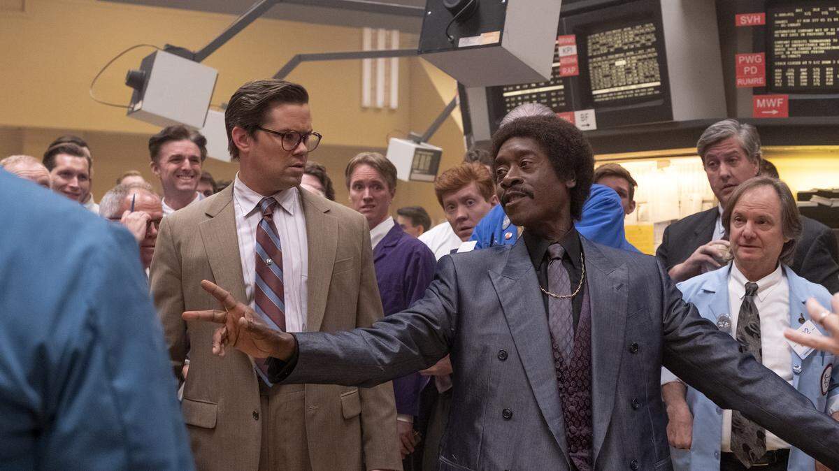 Andrew Rannells, left, as Blair Pfaff and Don Cheadle as Maurice Monroe in the new Showtime series “Black Monday.”