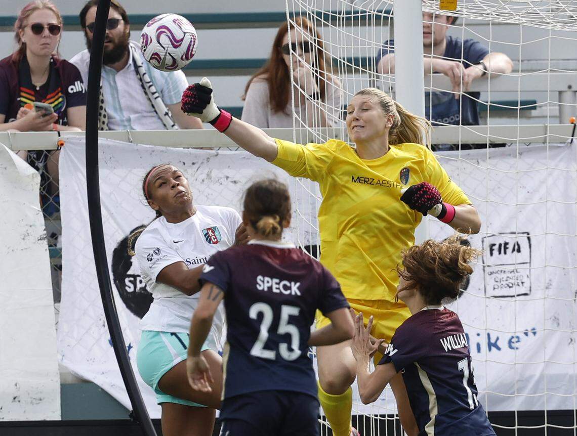 North Carolina goalkeeper Casey Murphy (1) knocks the ball away from Kansas City forward Michelle Cooper (17) during the second half of the Courage’s 1-0 victory over the Kansas City Current at WakeMed Soccer Park in Cary, N.C., Saturday, March 25, 2023.